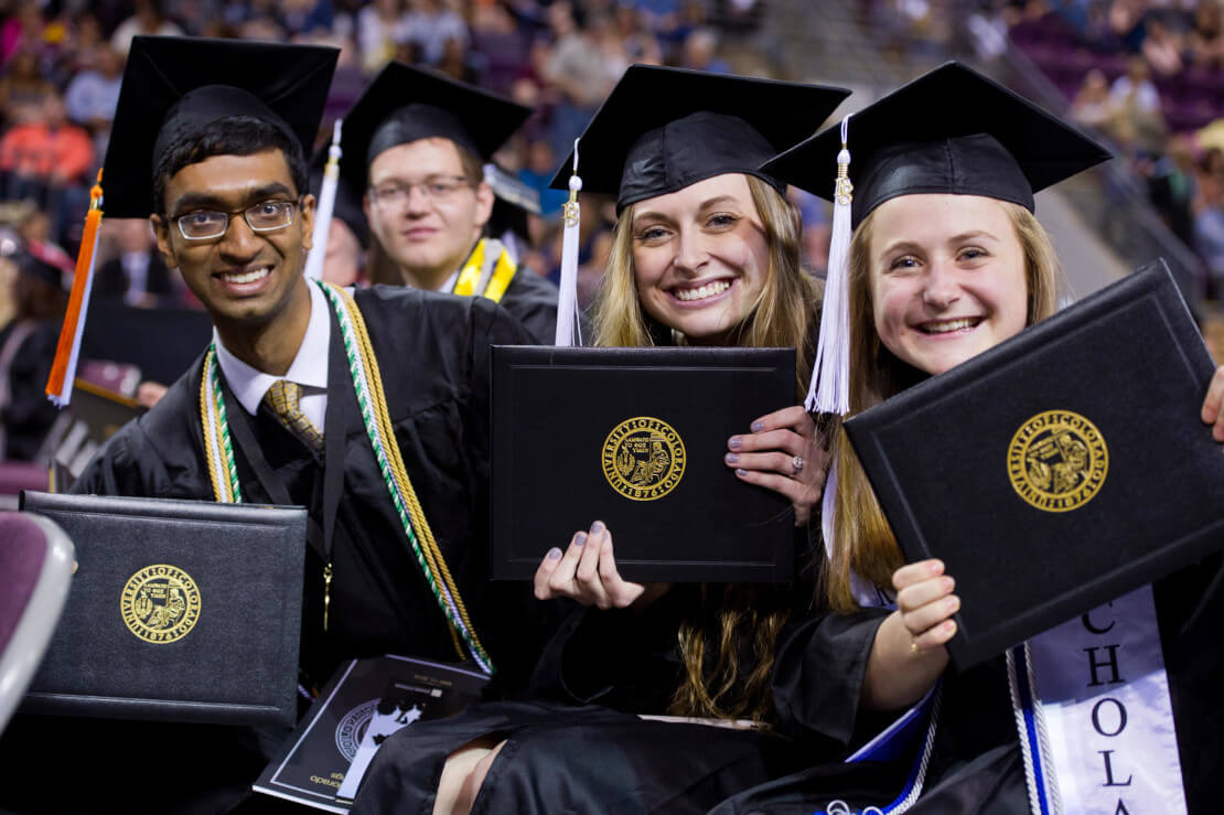 Students graduating in commencement garb