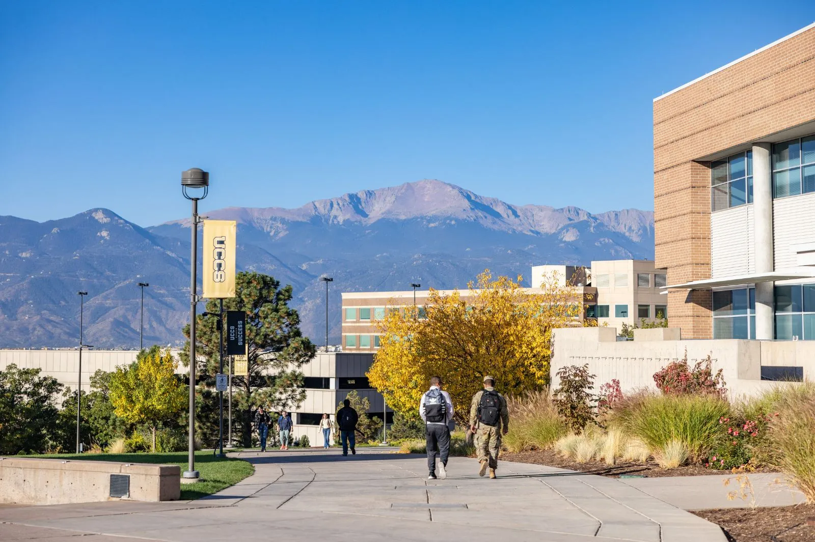 Military student in uniform walking on campus